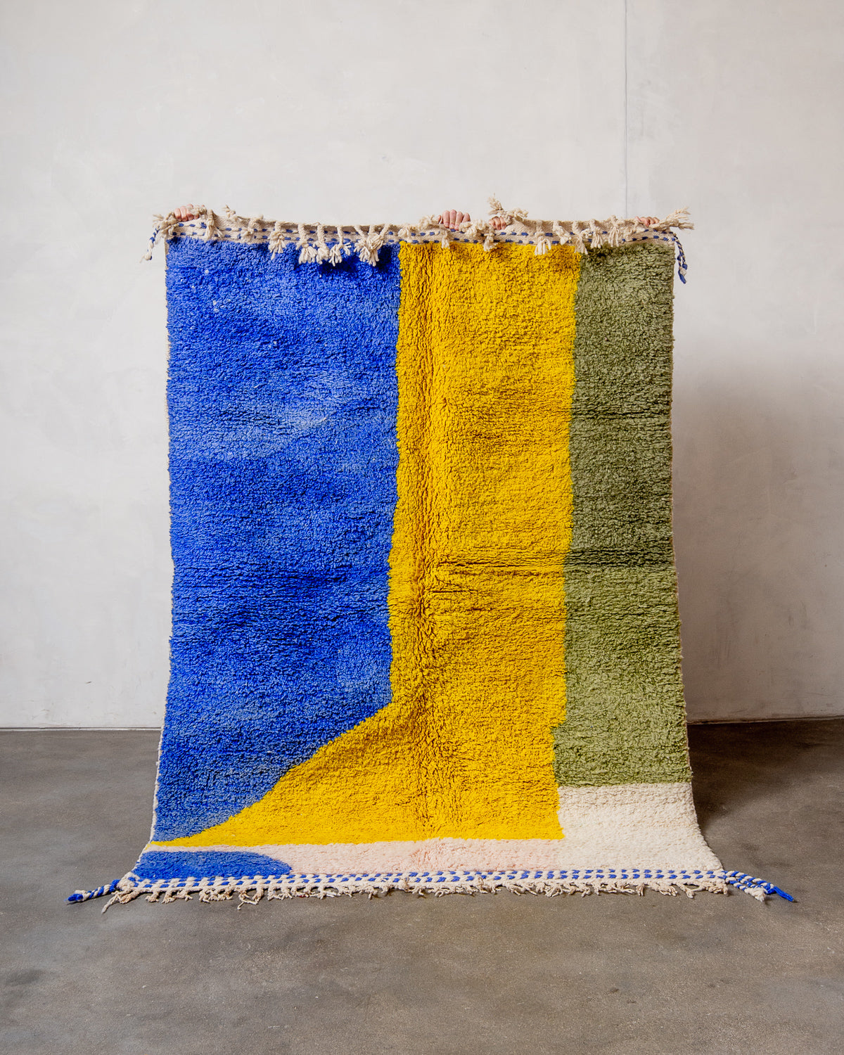 Modern, designer, handcrafted Berber rug from Morocco. Beniourain carpet with beautiful colours and patterns and fluffy wool texture.